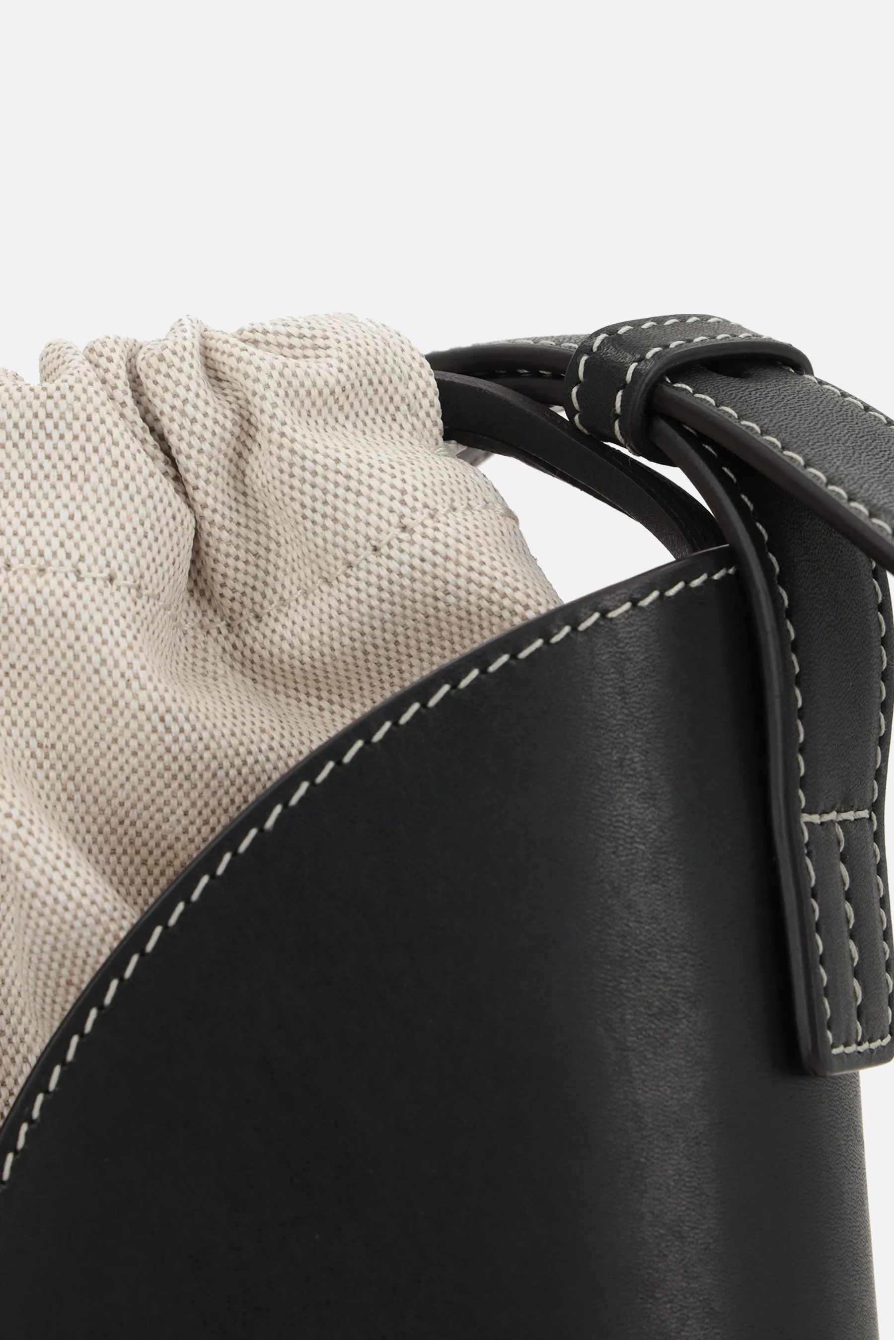 Curve small smooth leather and canvas bucket bag